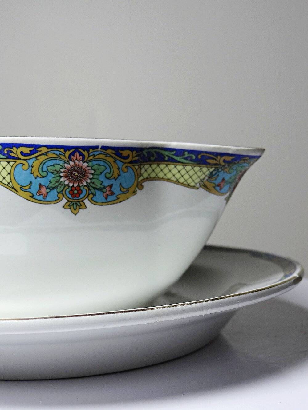 Old Luneville sauce boat, opaque porcelain with polychrome decoration.