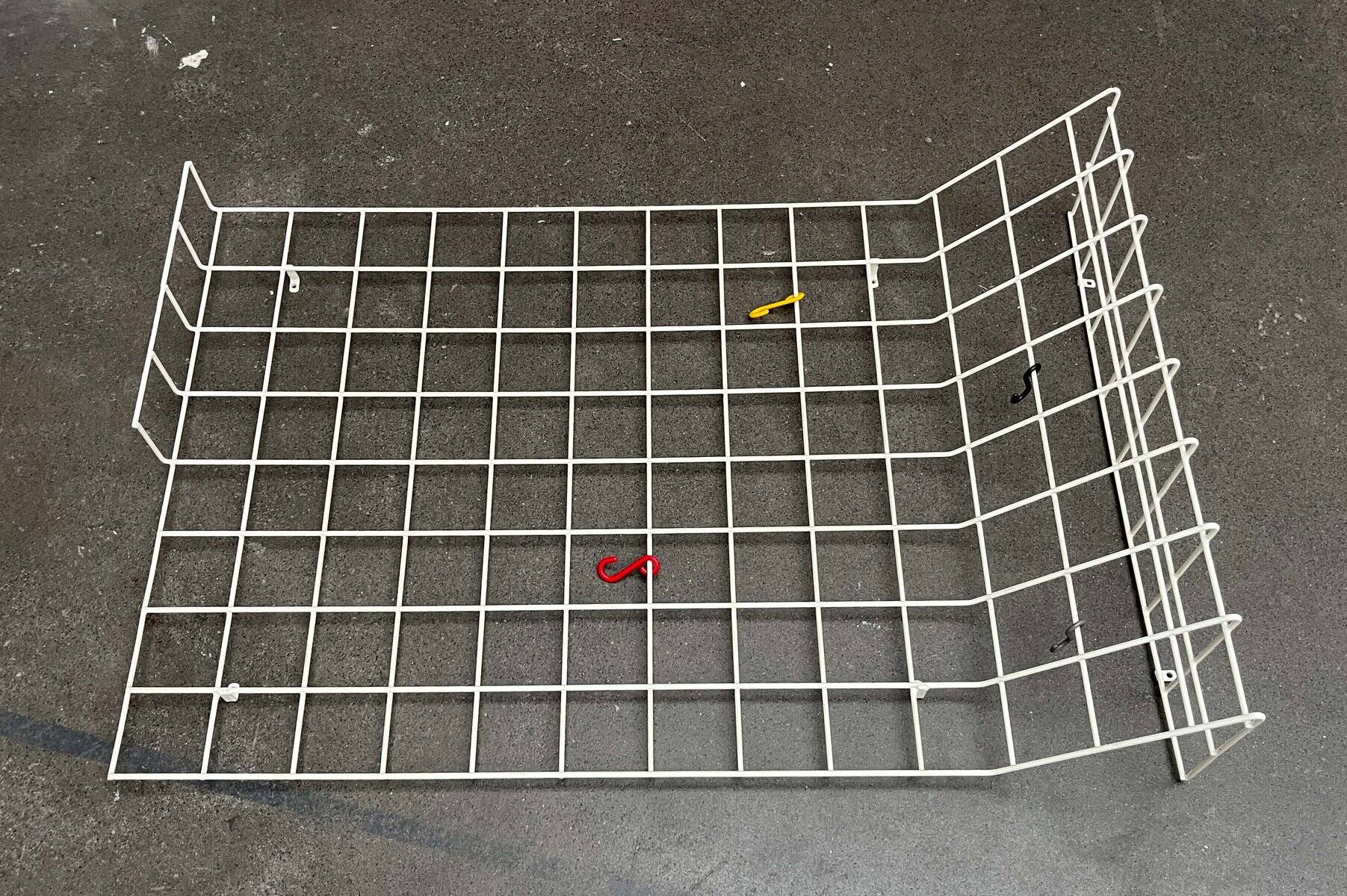 Minimalist white wire coat rack from mid-century Germany, 1960s.