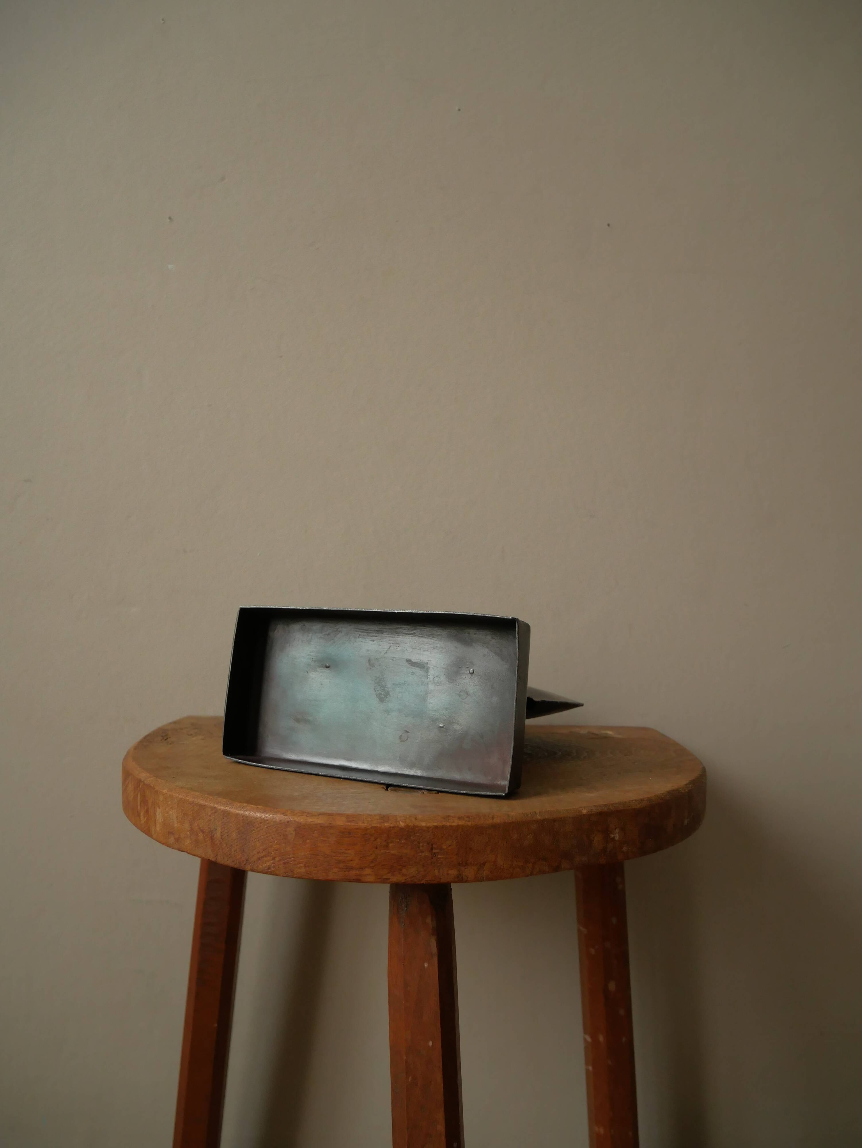 Candle holder in metal