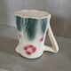 Small antique jug in slipware.