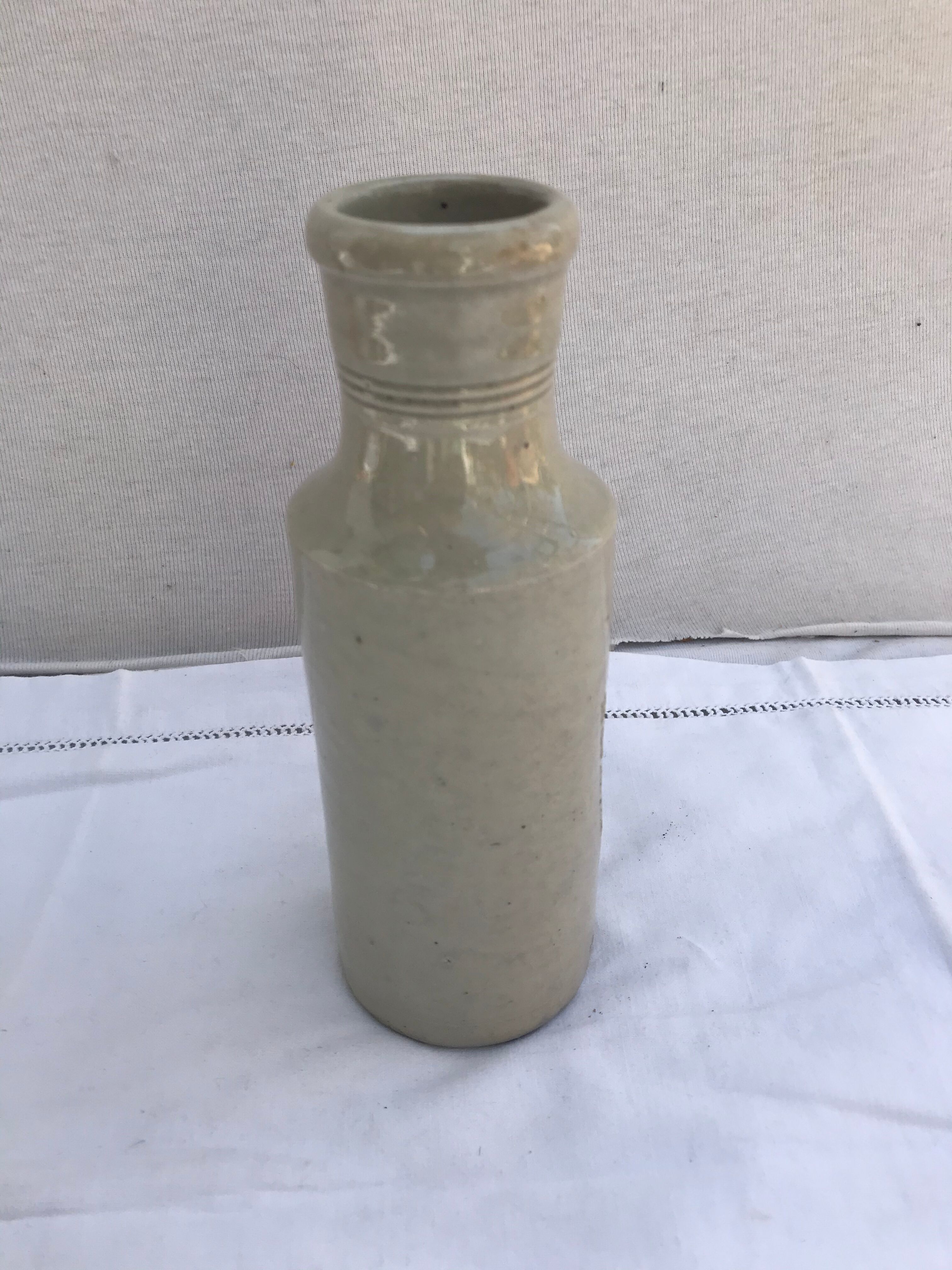 Old ceramic bottle beige Fourgault Courbevoie Paris vintage
