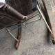 Mid-Century Japanese rocking chair in black leather, metal, and wood by Takeshi Nii (1950s)