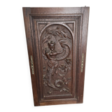 Ancienne porte en bois sculpté en chêne