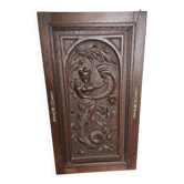 Ancienne porte en bois sculpté en chêne
