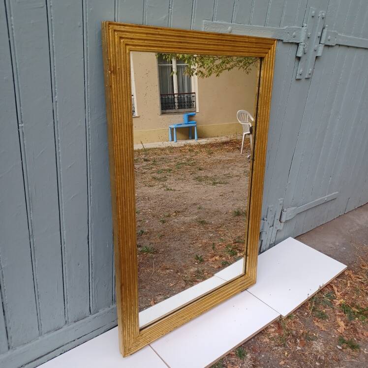 Grand golden mirror from the revolutionary period 110 cm x 74 cm