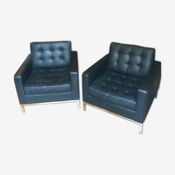 Pair of black leather armchairs