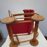 Old rattan doll stroller