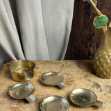 Individual brass ashtrays with storage support