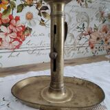 Brass pusher candle holder on oval frame