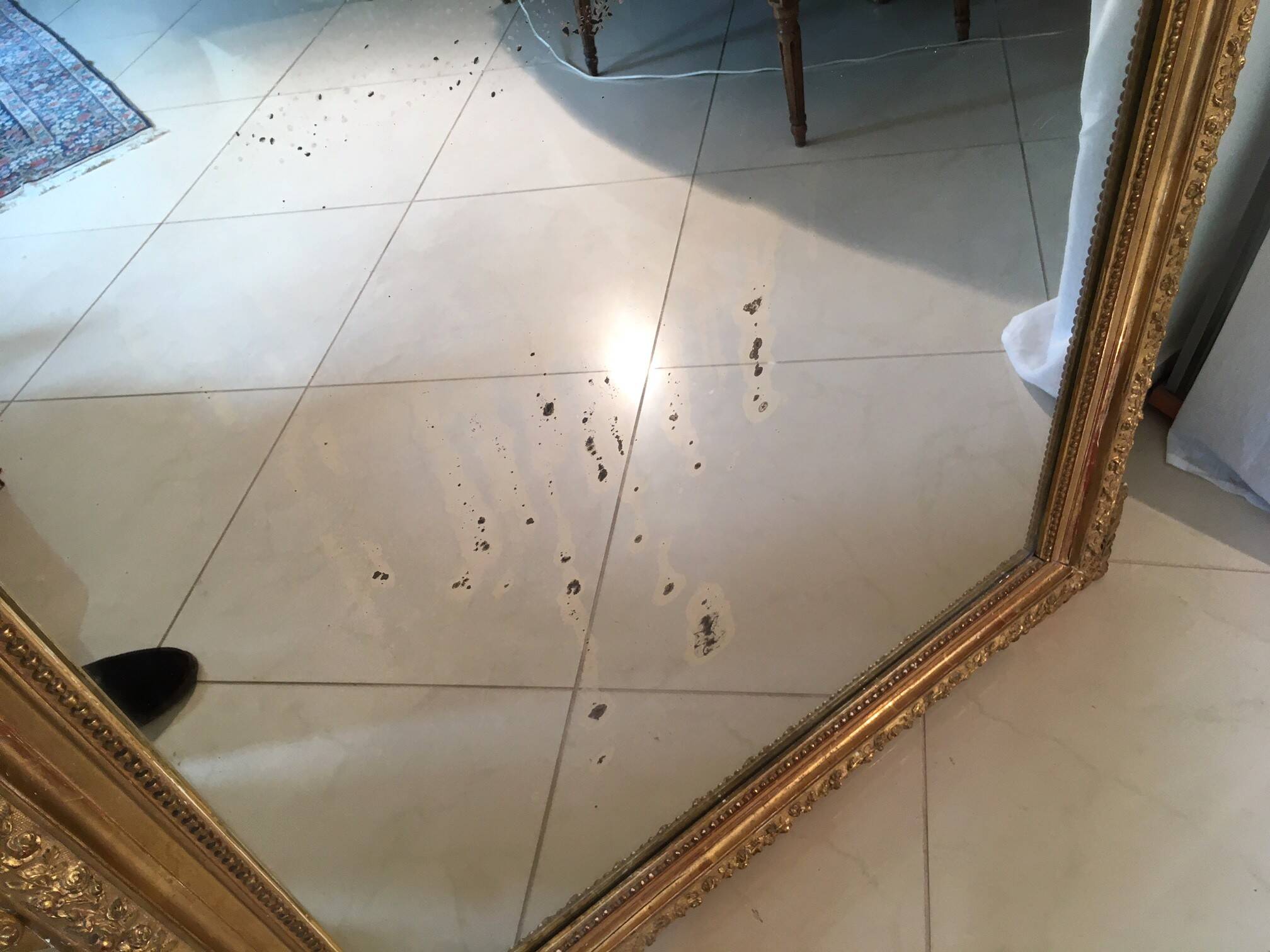 Louis XVI style and 19th century fireplace mirror