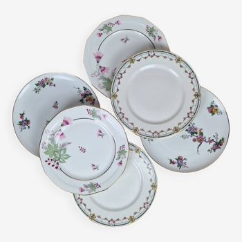 Composition de 6 assiettes plates en porcelaine de Limoges :