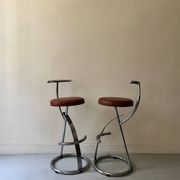 Bar stools in tubular chrome and tan leather, 1970s