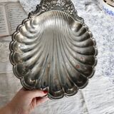 Large vintage shell-shaped platter in shiny silver-plated metal.