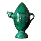 Decorative piece in green glazed stoneware, jug shape.