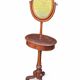 Barber's or shaving mirror on a Victorian stand. 19th century.