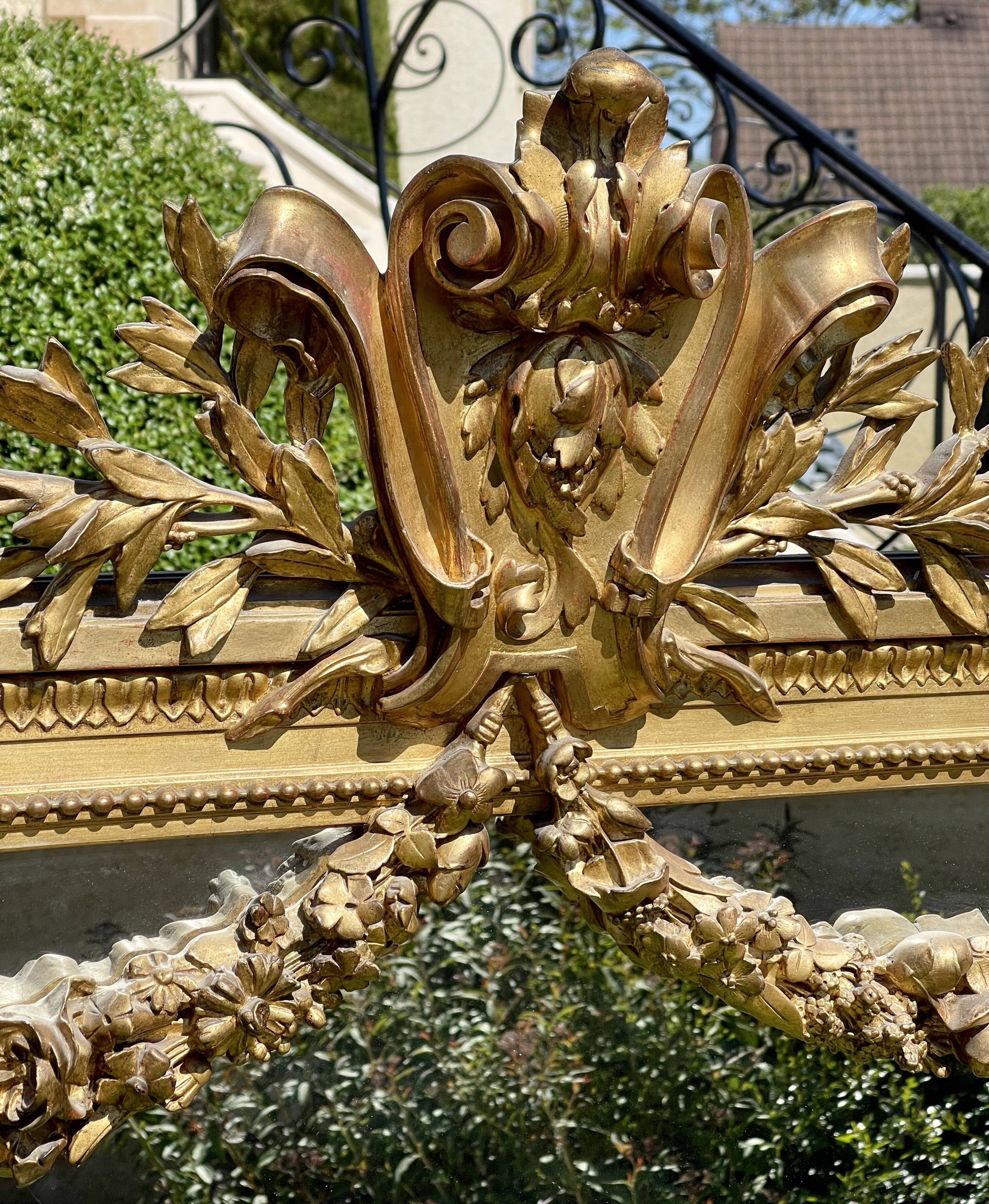 Gilded plaster mirror Louis XVl style