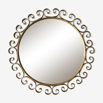 Miroir rond avec arabesques en métal doré