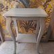 Console in gray painted wood with a lower tray