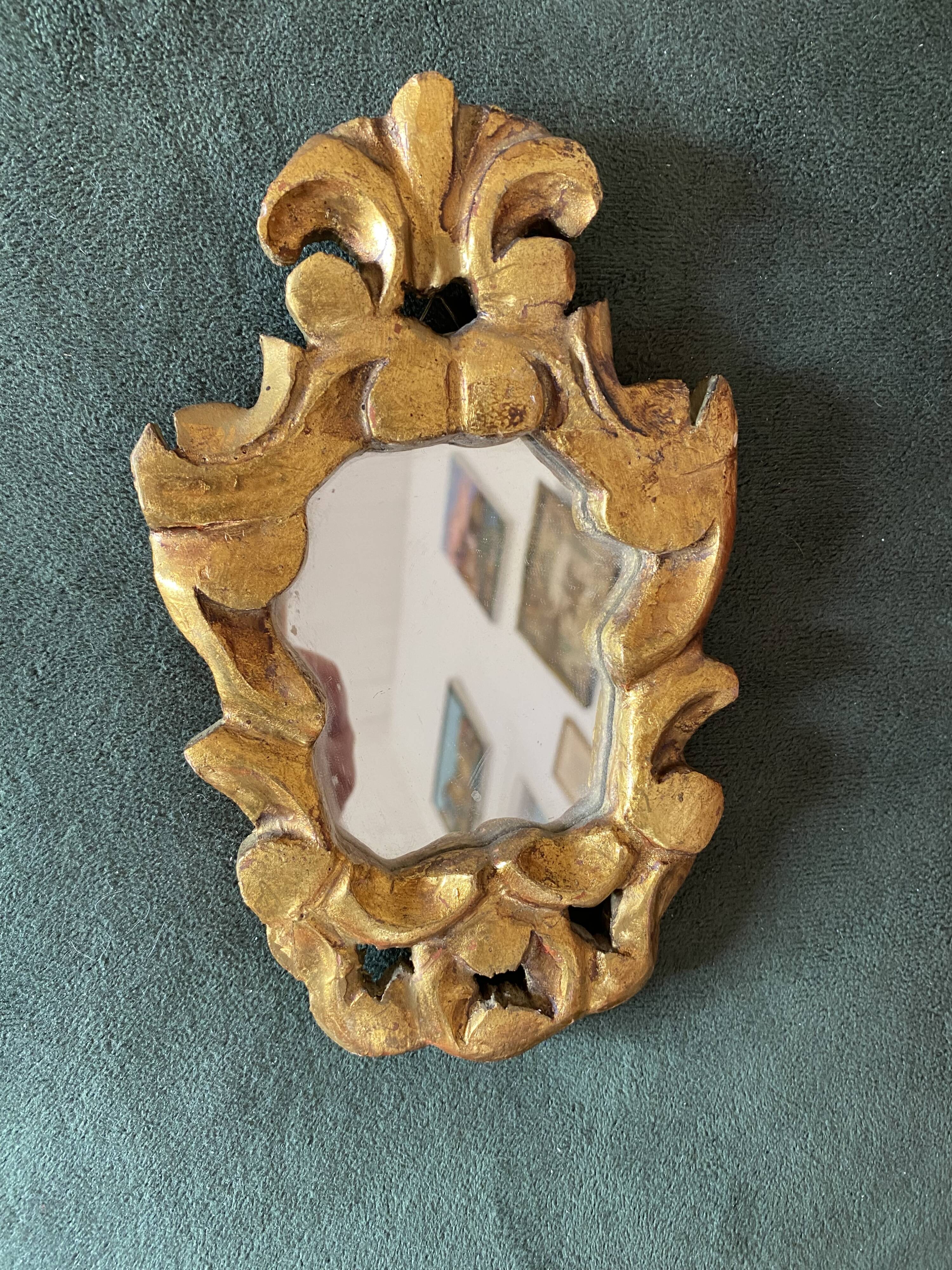 Small baroque gilded wood mirror.