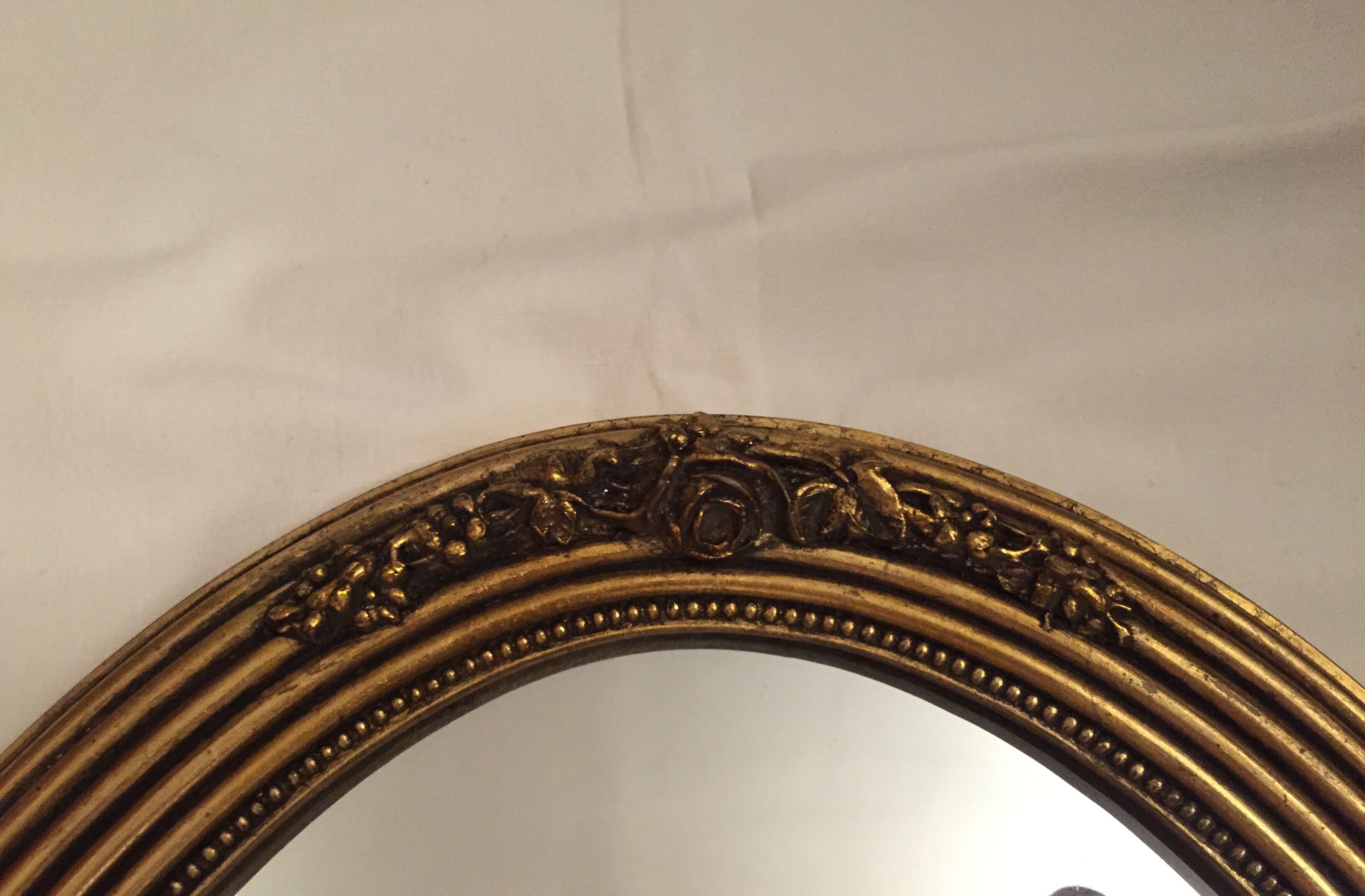 Miroir ovale en bois doré 85x43 cm