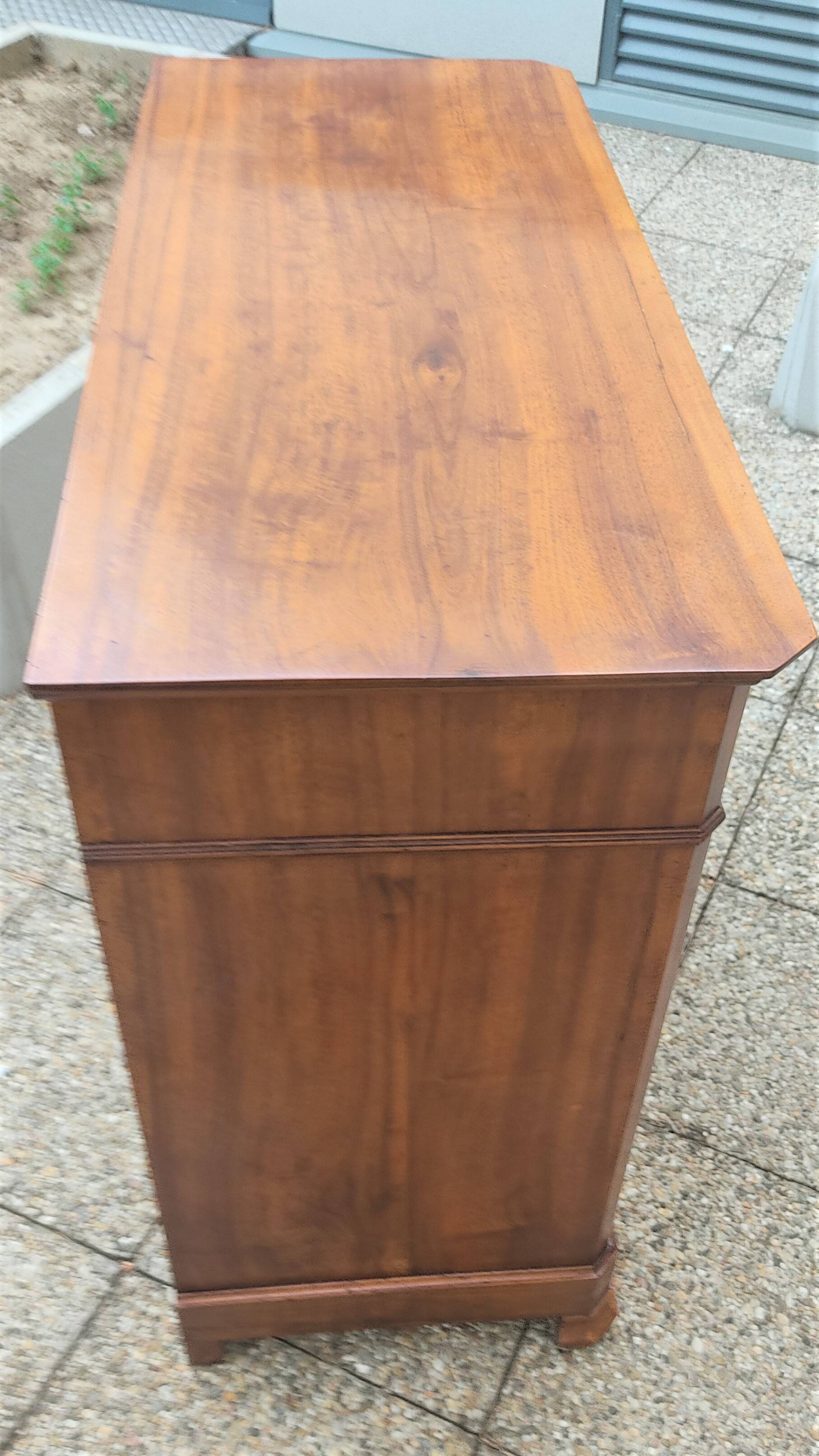 Solid walnut sideboard of the Napoleon III period, late nineteenth century, Louis Philippe style