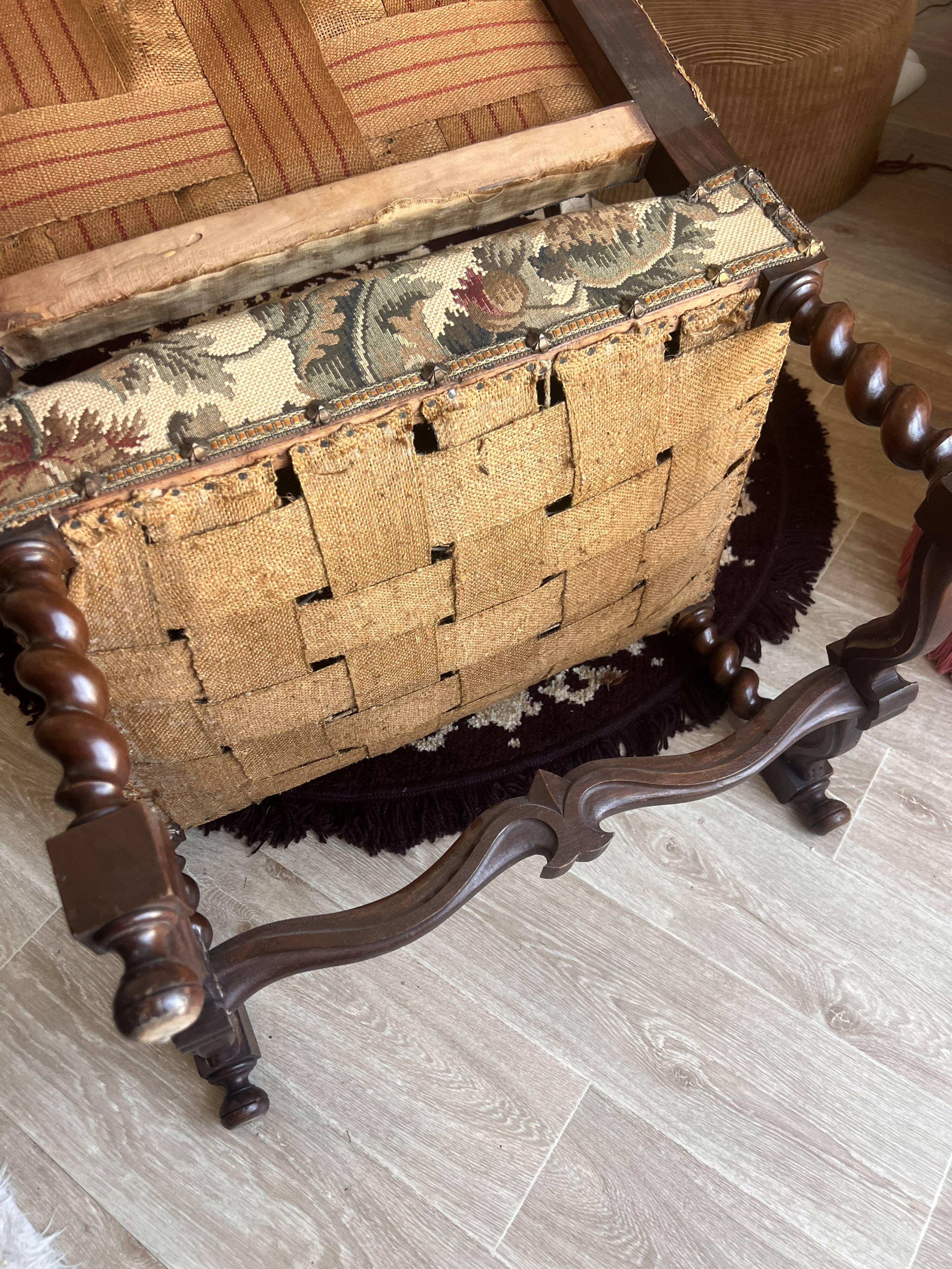 Antique armchair in Henri II style with masks
