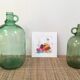 Pair of old demijohn bottles