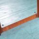 Minimalist Scandinavian mirror in teak with a vintage design.