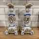 Set of two old Rouen candlesticks.