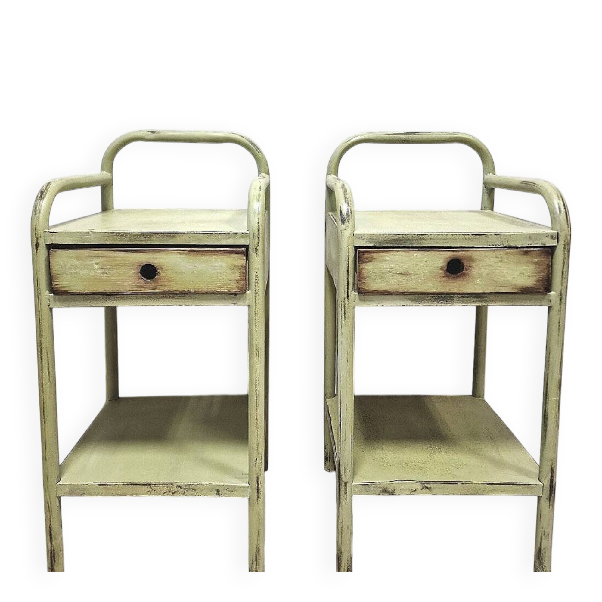 Copy of a pair of patinated metal bedside tables.
