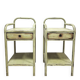 Copy of a pair of patinated metal bedside tables.