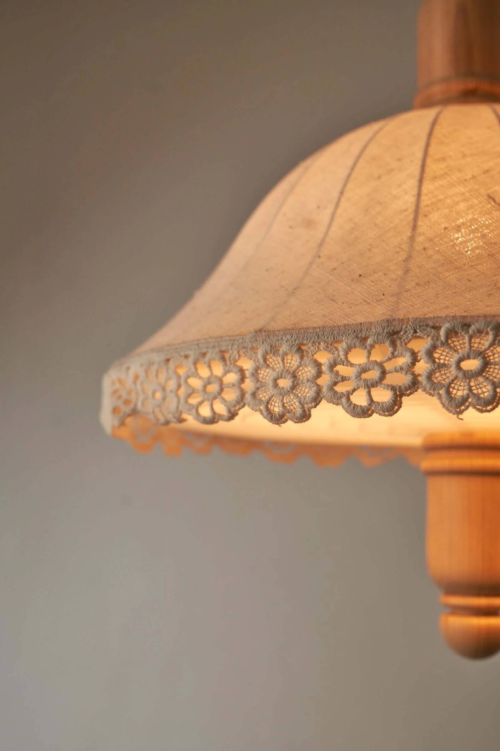 Wood and textile pendant from Sweden