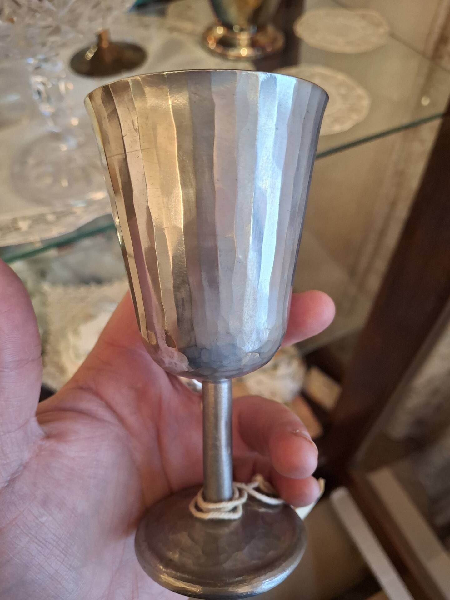 Footed glass in pewter