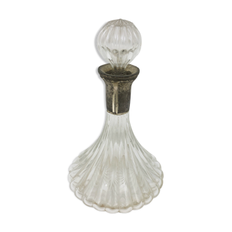 Large glass decanter and tin ring