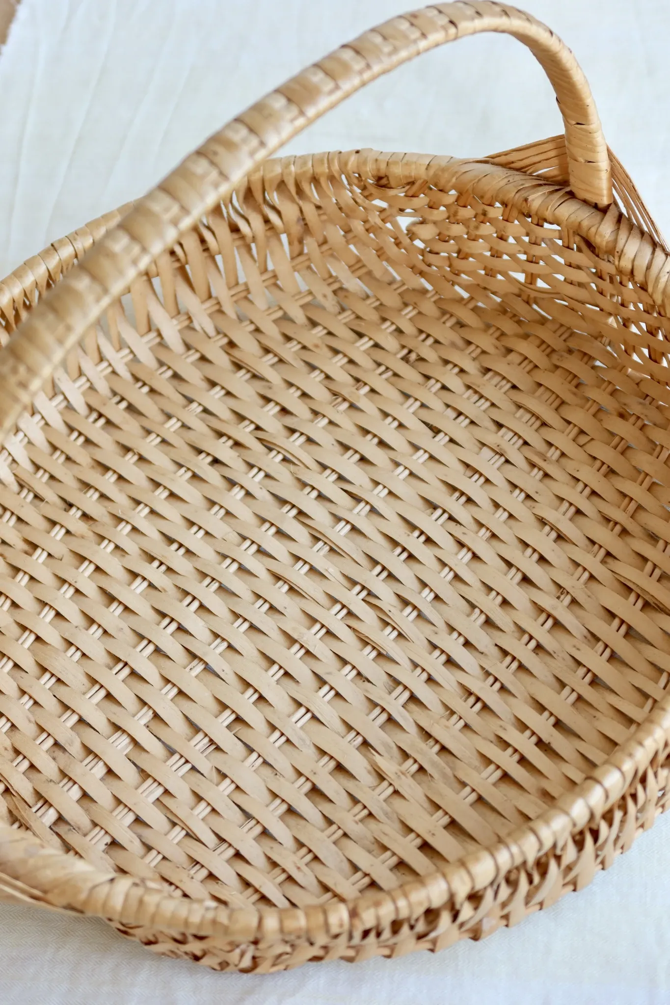 Vintage hand-woven wicker harvest basket