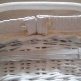 Wicker and painted wood baby cradle