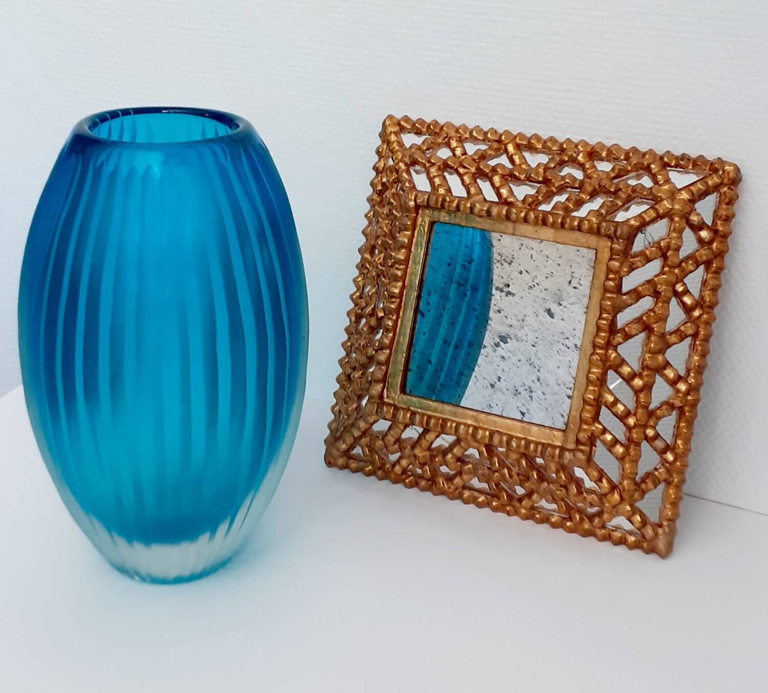 Antique turquoise glass vase