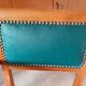 Fauteuils bridges en cuir vert