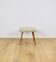Tabouret en bouclé beige - pieds ronds en hêtre - 2 pièces disponibles