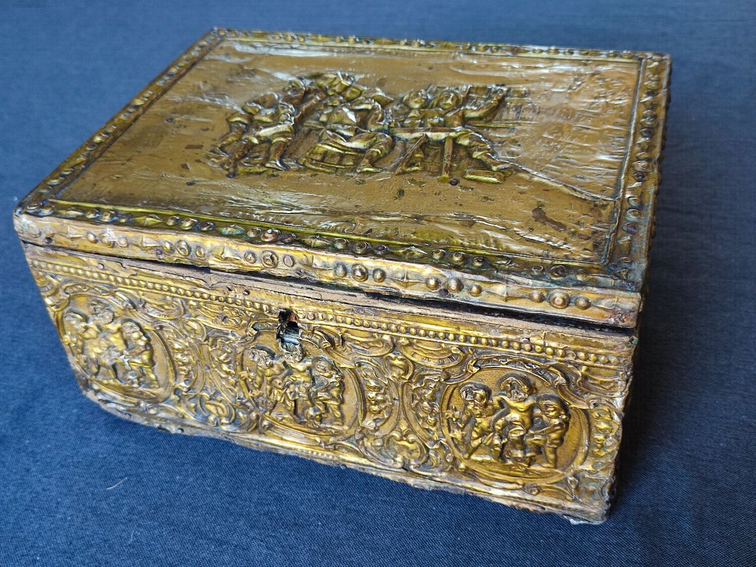 Old wooden box/casket covered with brass
