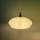 Pair of Art Deco light fixtures in light green speckled glass, 1930s.