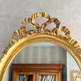 Gilded mirror with pediment