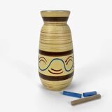 Ethnic trendy striated ivory vase from the 60s