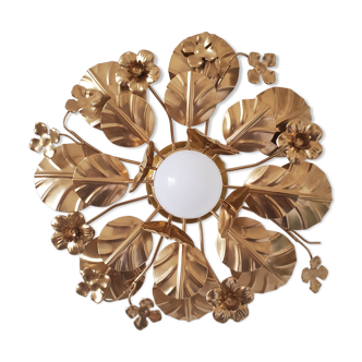 Golden metal flower sconces