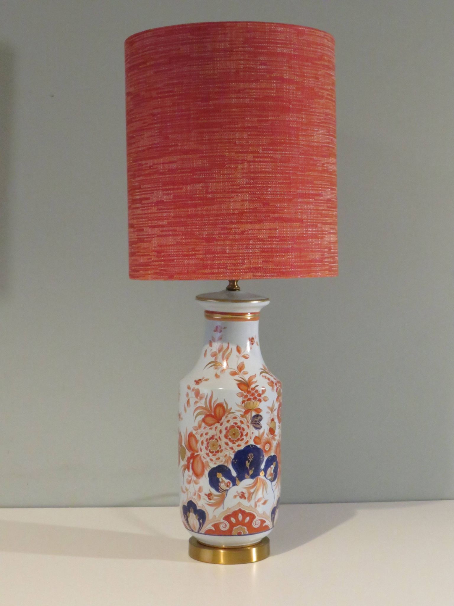 Vintage ceramic table lamp with an Imari-inspired pattern.