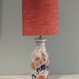 Vintage ceramic table lamp with Imari-inspired pattern.