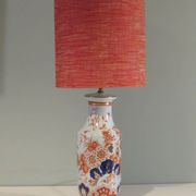 Vintage ceramic table lamp with an Imari-inspired pattern.