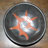 Black and red ceramic cup