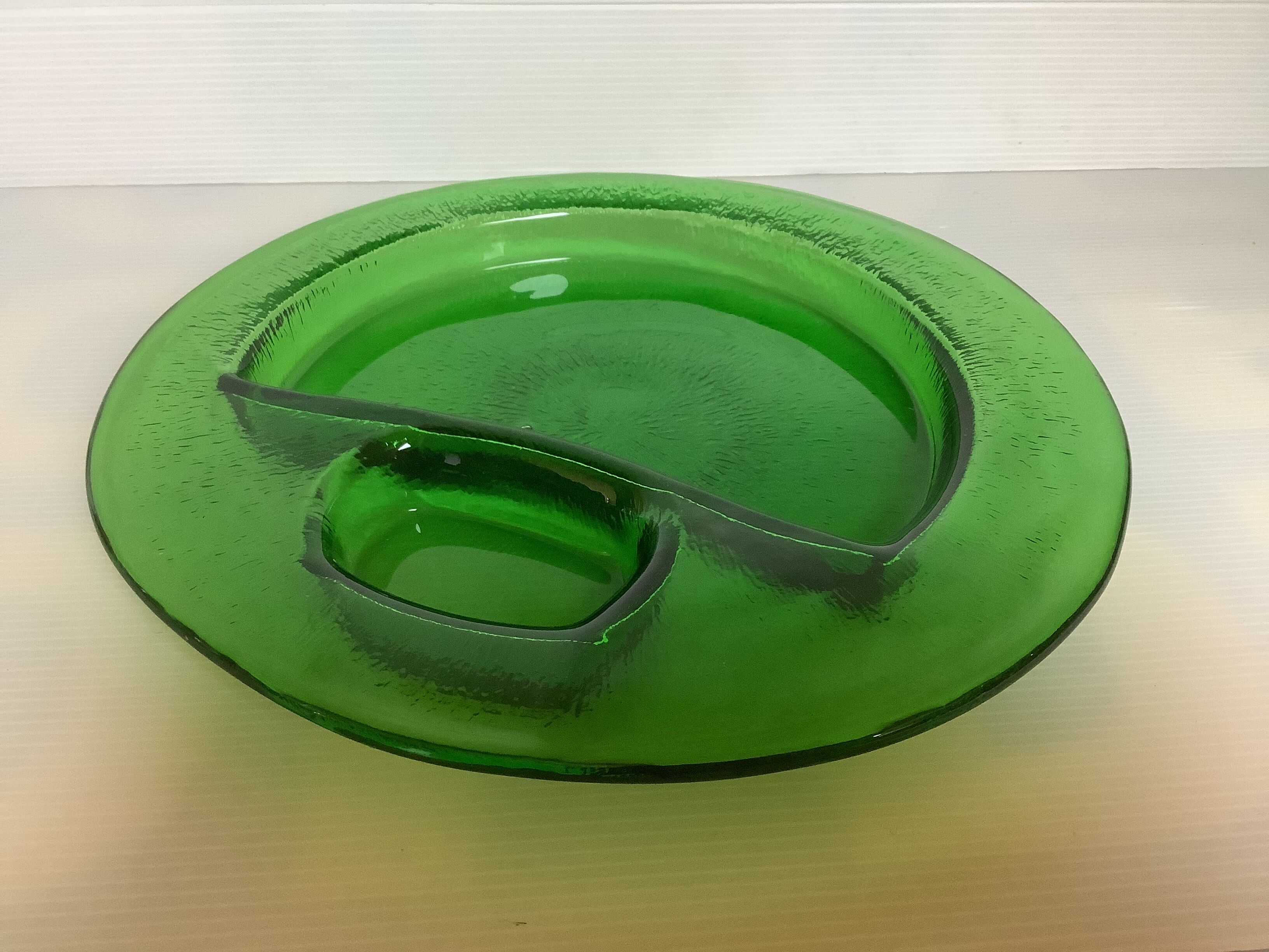 Handcrafted thick green glass empty pocket
