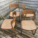 4 magnificent Baumann sled chairs, with caning.